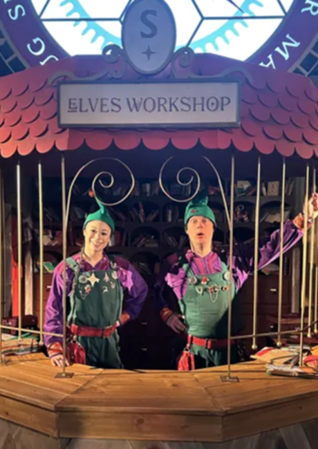 Santa’s Lapland elves welcoming families into the Elves’ Workshop during their Lapland holiday.